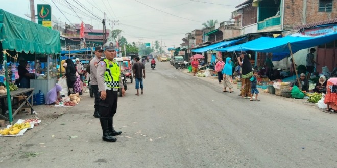 Polsek Lawe Sigala-gala Laksanakan Pengaturan Arus Lalu Lintas di Pasar Tumpah Lawe Sigala-gala