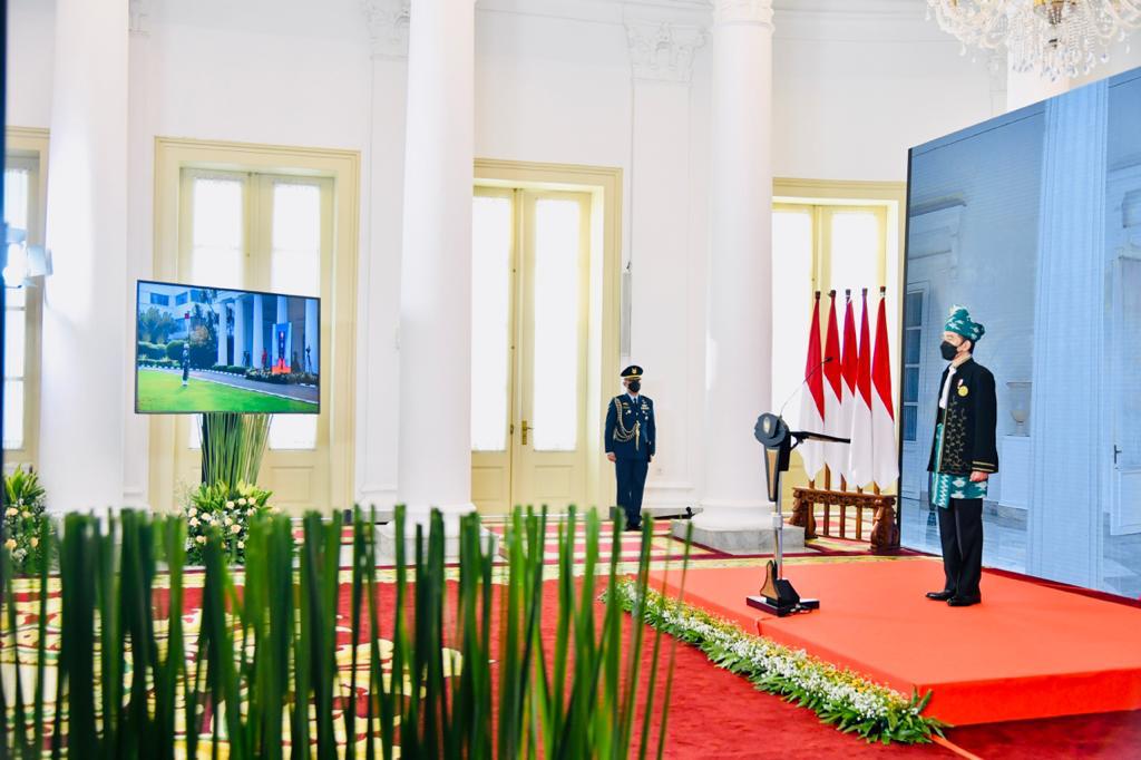 Kenakan Pakaian Adat Tanah Bumbu, Presiden Jokowi Pimpin Upacara Peringatan Hari Lahir Pancasila Tahun 2021