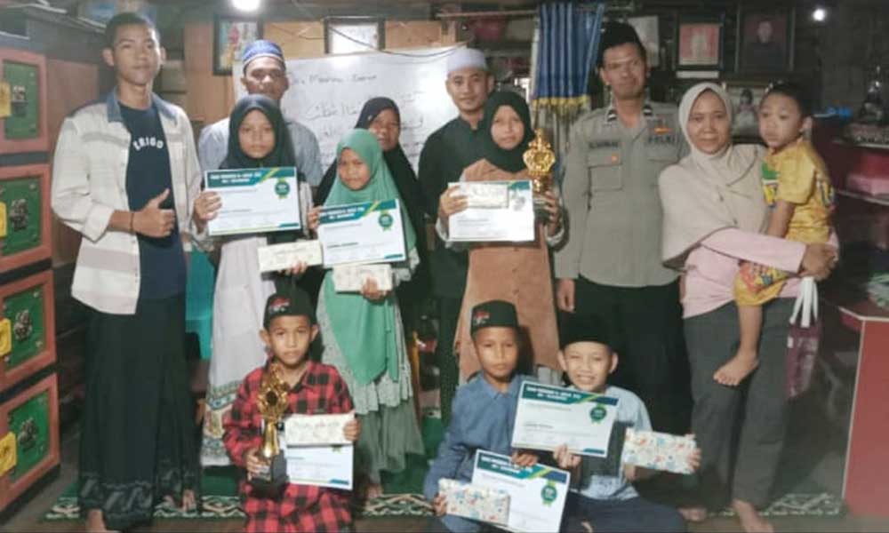 Polisi Baik Aipda M. Aliudin, S.H. Adakan Lomba Adzan di TPQ Al-Hikmah