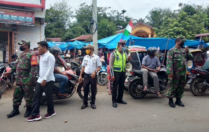 Penegakkan Disiplin Protokol Kesehatan, Koramil 09/Sosa Berikan Sosialisasi di Pasar Ujung Batu